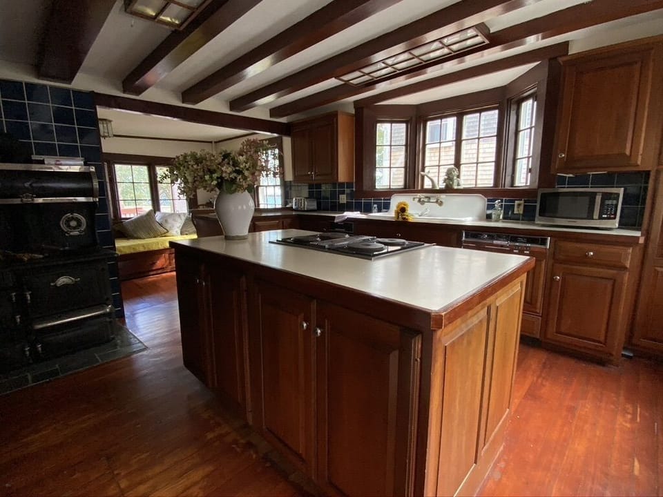 1st Floor: Kitchen (looking towards the back of house), 1st Floor Porch access