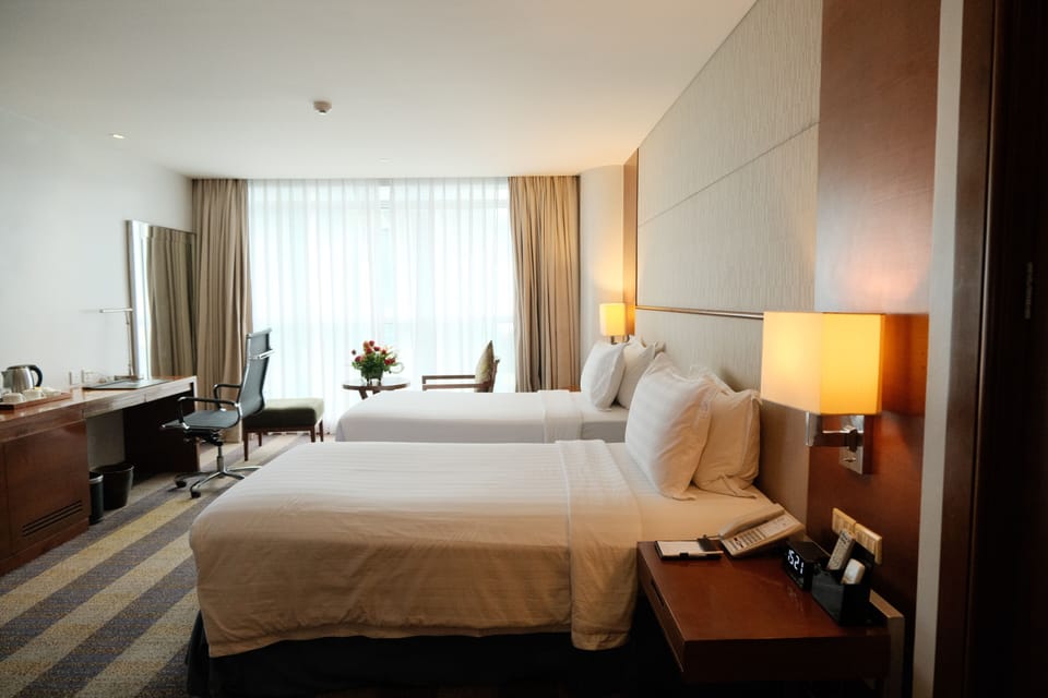 Business Class- Twin | Memory foam beds, minibar, in-room safe, individually decorated