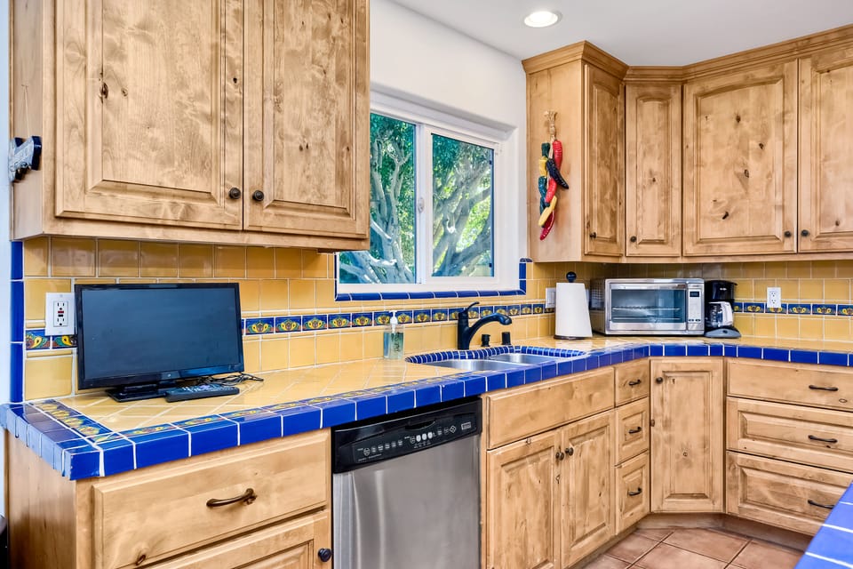 SmartTV in the kitchen so you watch some tv while preparing a meal.