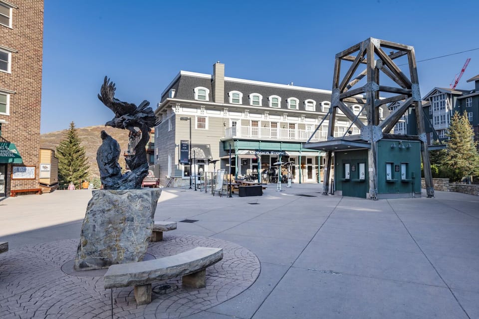 Unit is the top floor of the building pictured