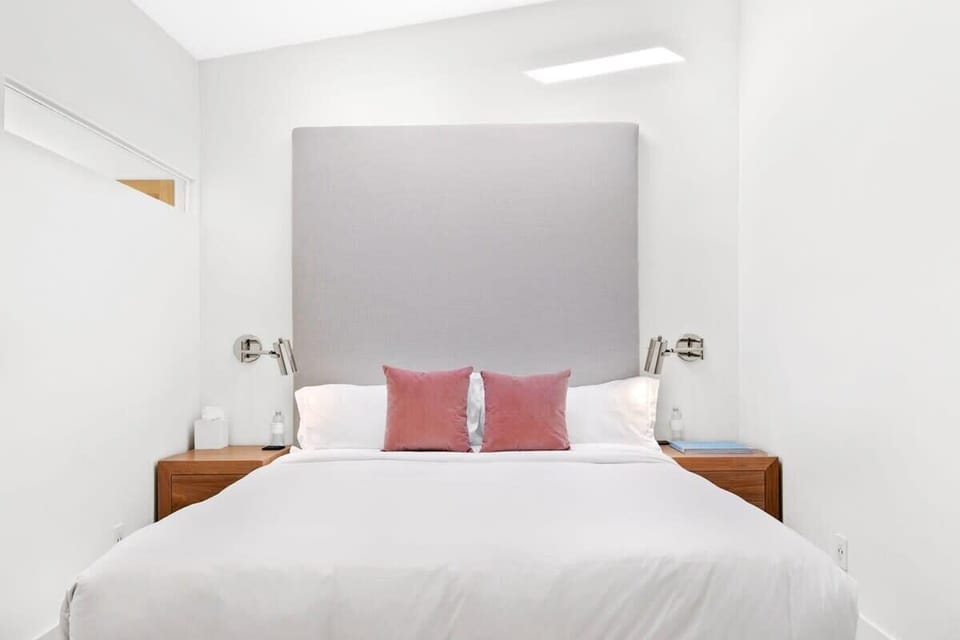 Custom made bed with custom sconces