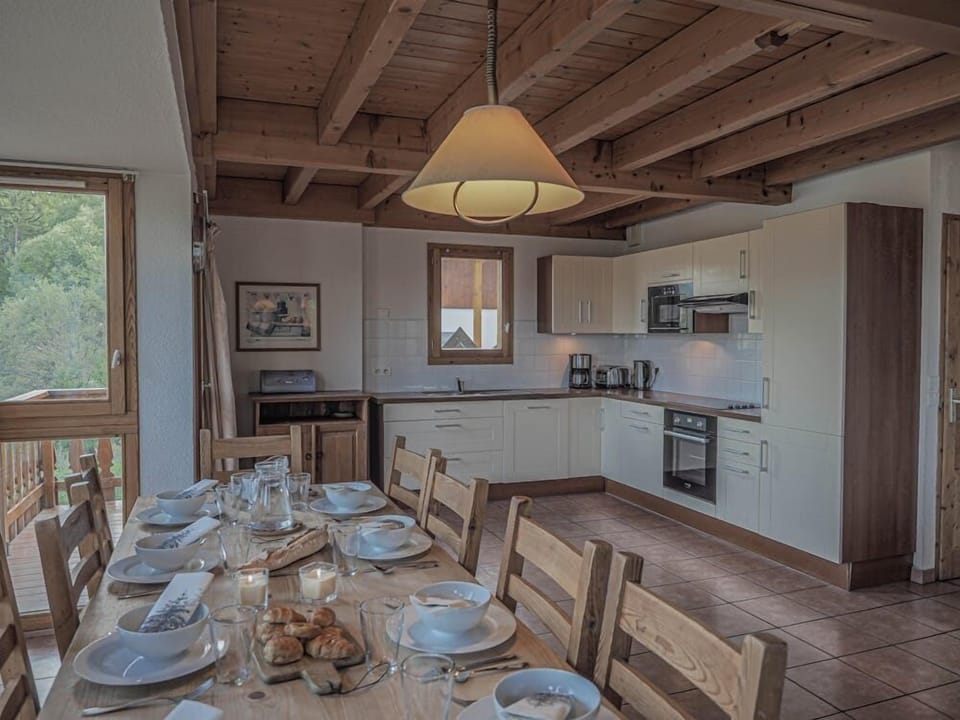 Dining through to kitchen with stunning views.