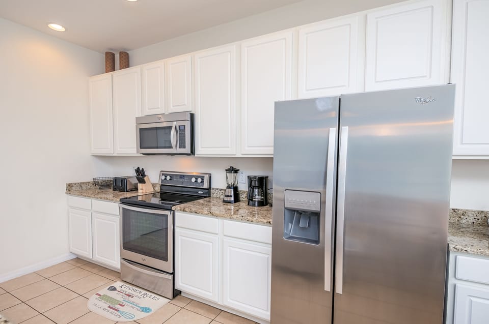 Townhome, 4 Bedrooms, Non Smoking, Kitchen | Private kitchen | Fridge, microwave, oven, dishwasher