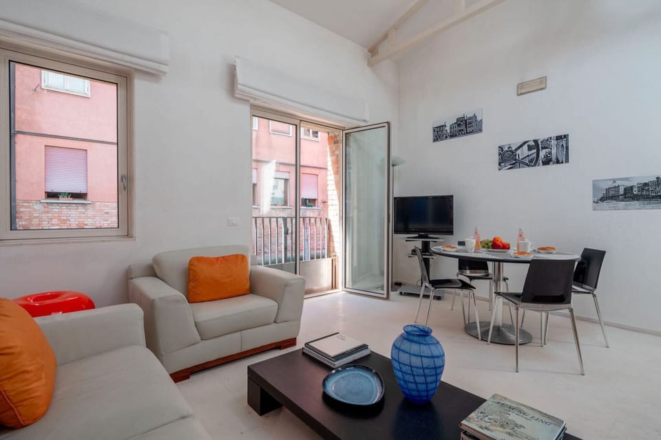 Apartment, 1 Bedroom | Living room | Flat-screen TV