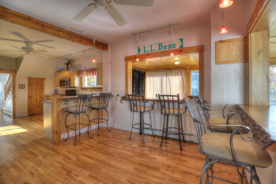 Open kitchen area looking into entry porch and hot tub area