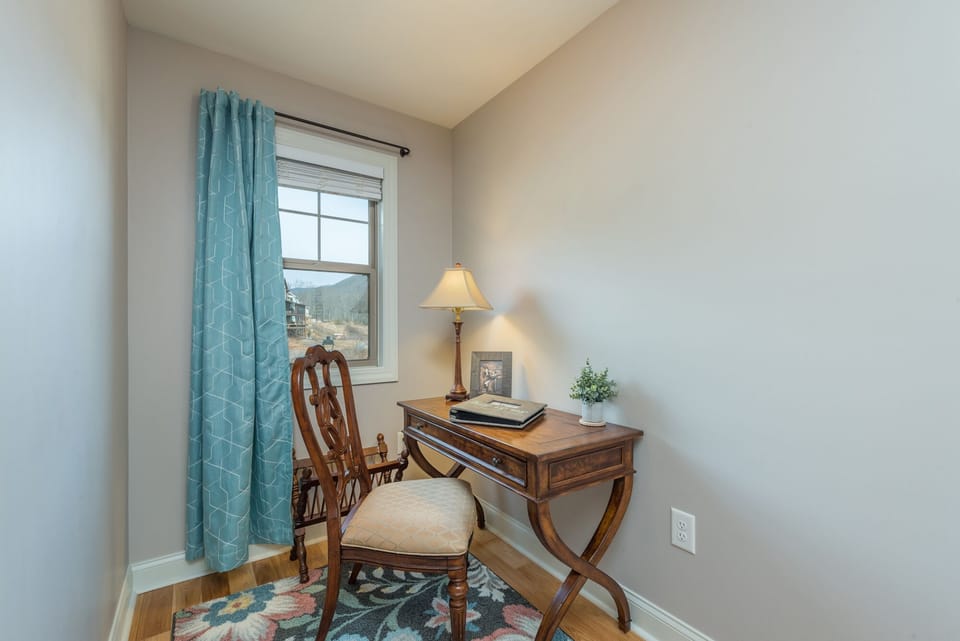 Convenient desk area upstairs—ideal for work or writing in a mountain retreat