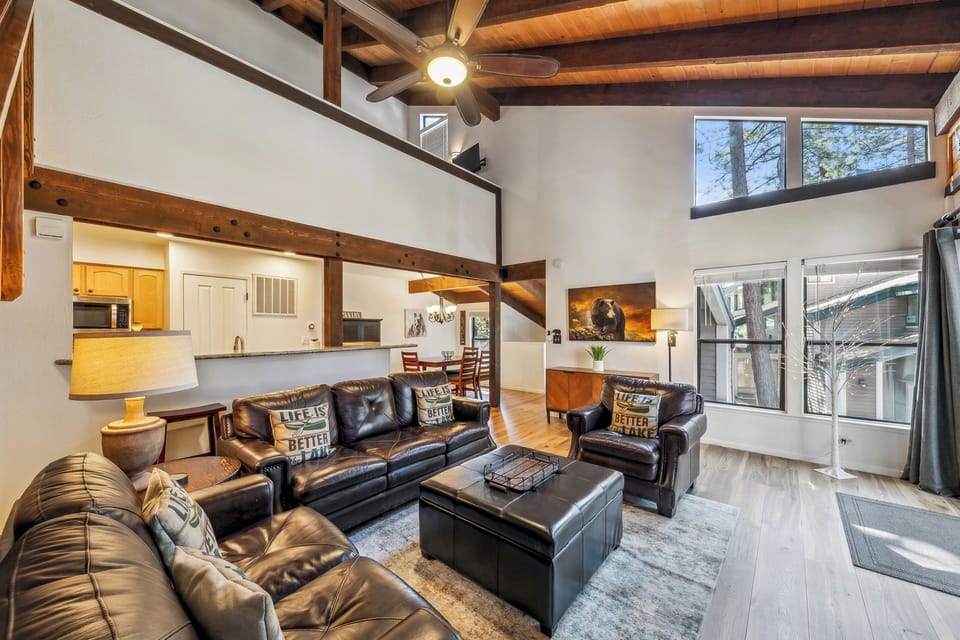 Relax in your rustic-modern retreat with exposed beams, leather seating, and soaring ceilings creating the perfect mountain getaway.