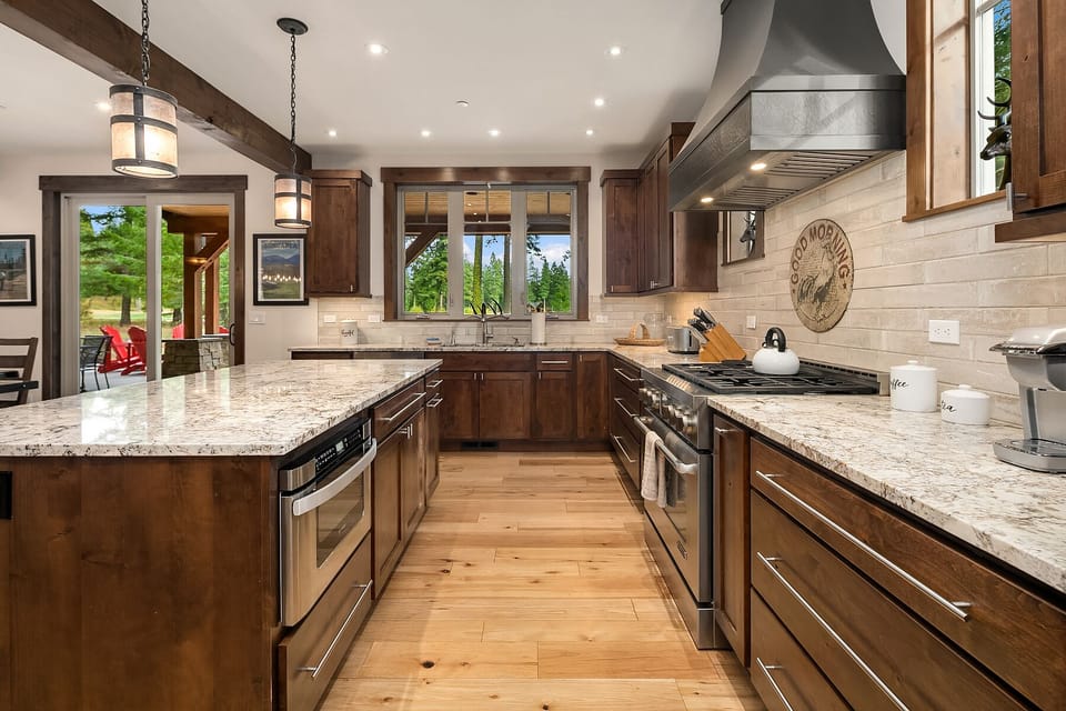 Larkspur Woods: - Granite kitchen with high-end stainless appliances.