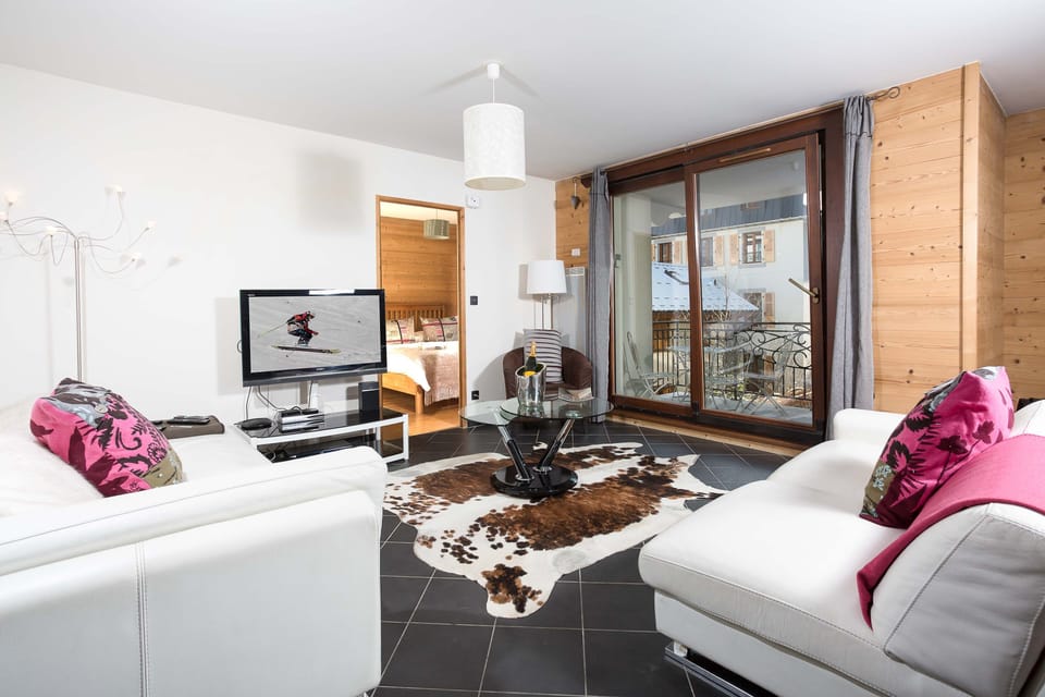 Spacious open plan lounge leading onto balcony
