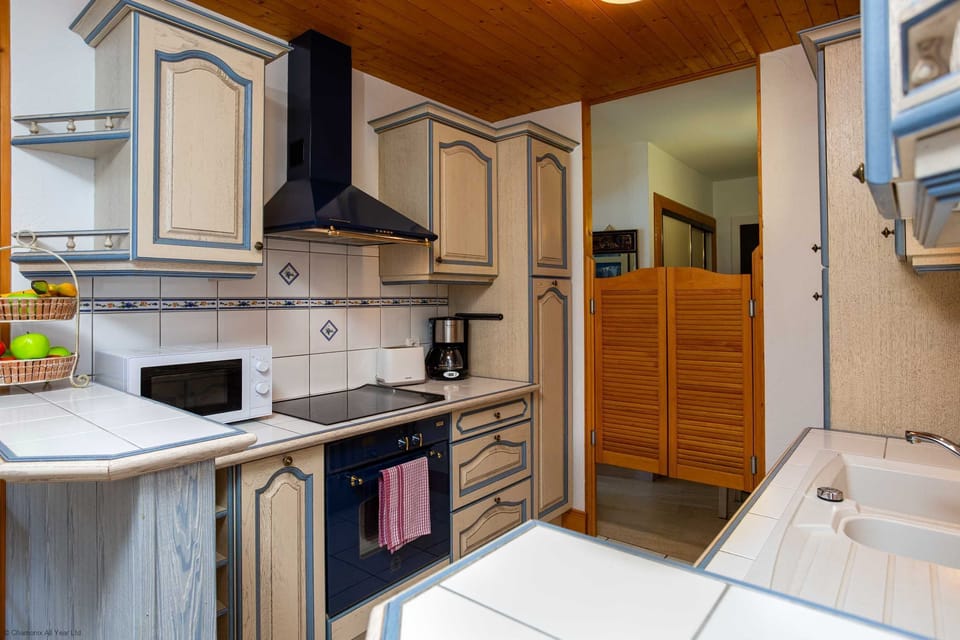 Separate kitchen leading onto dining area