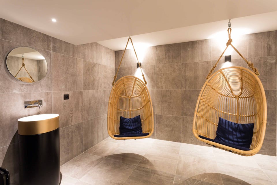 If you have to wait for the sauna, grab a seat in an 'egg'