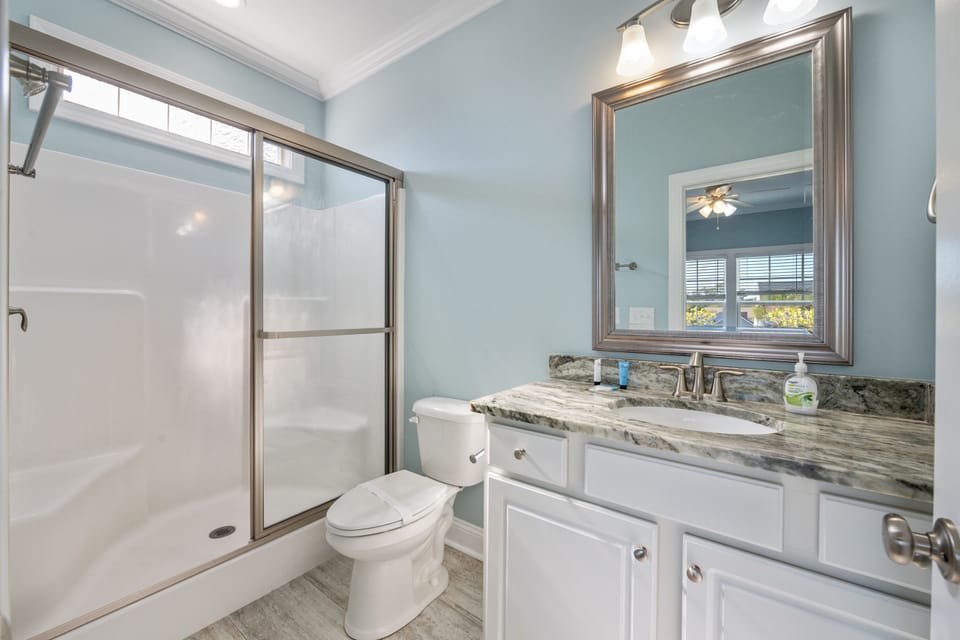 Wash the day away in this spacious bathroom.