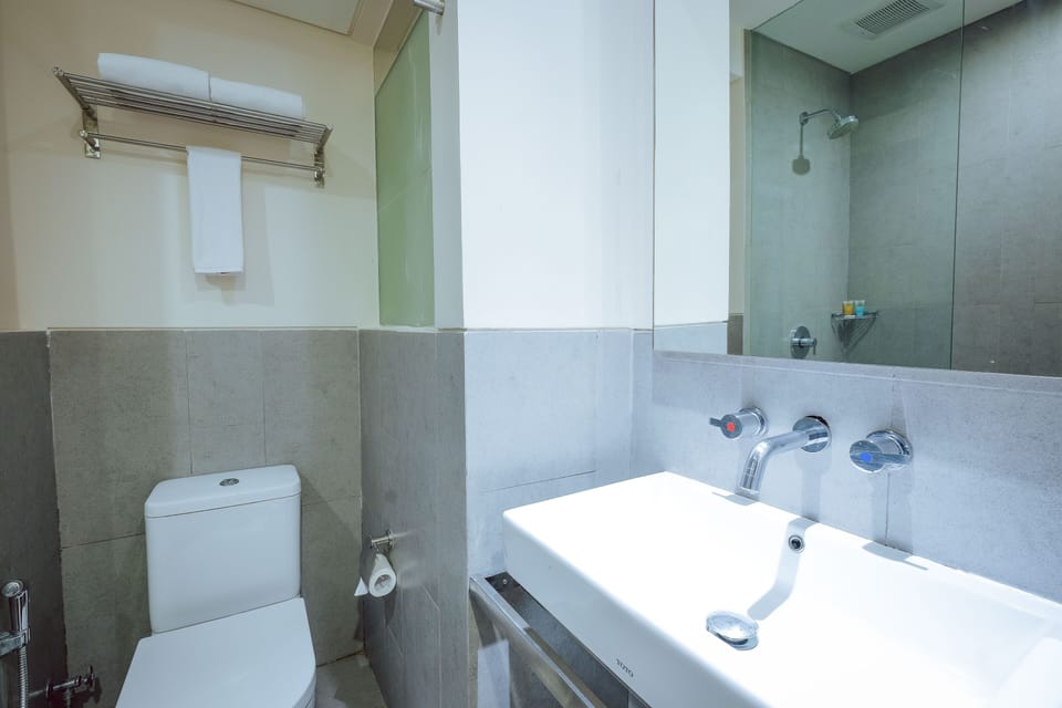 Shower, free toiletries, hair dryer, slippers