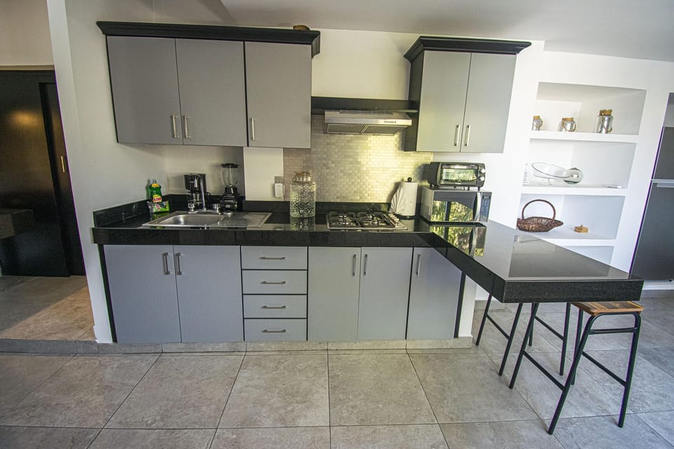 Beautiful kitchen space with eat in bar