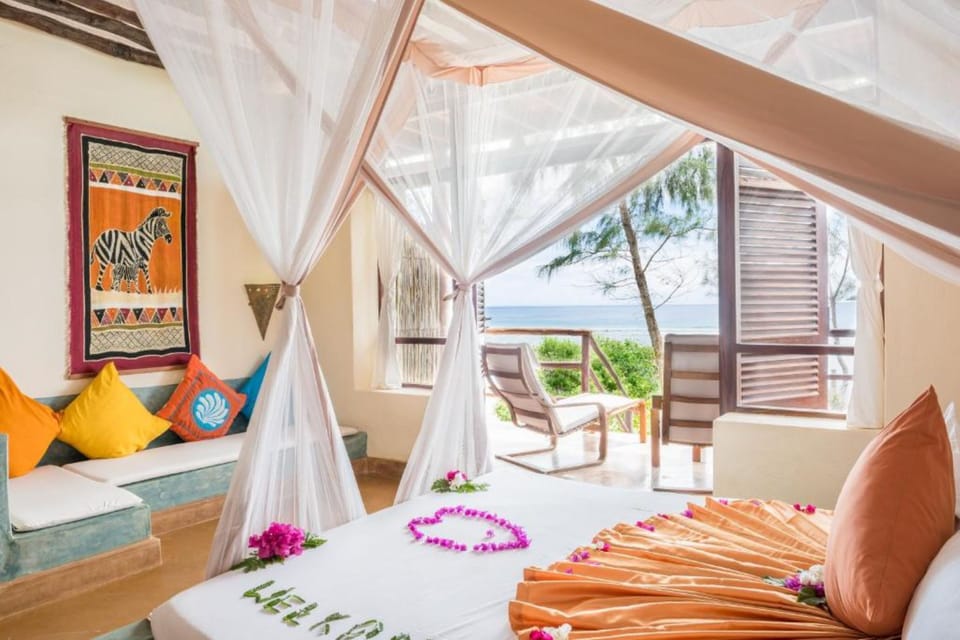  Deluxe Ocean Suite | Down comforters, minibar, in-room safe, desk