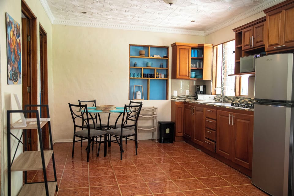The kitchen is seamlessly connected to the living area. 