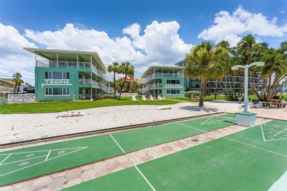 Enjoy a classic Florida shuffleboard game right outside your door, surrounded by beautiful tropical scenery and endless sunshine.