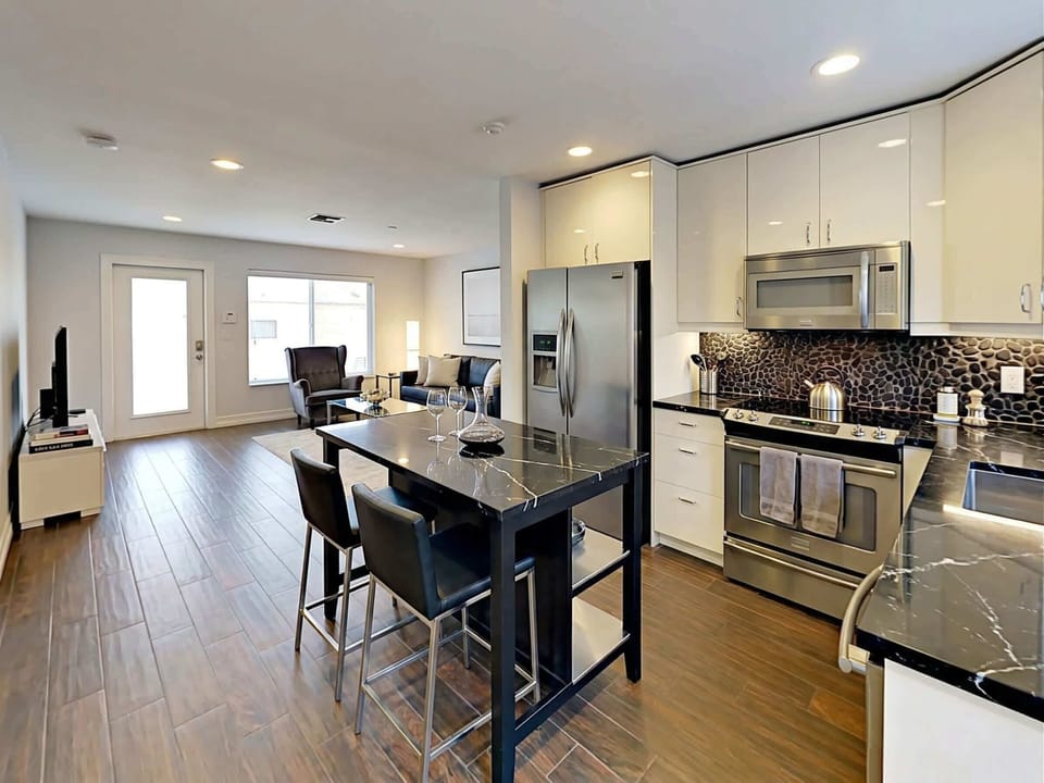  A refined space where morning coffee, evening wine, and effortless living come together in perfect balance.