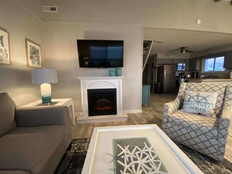 Cozy fireplace!  It can be turned on for the ambience with and/or without heat.