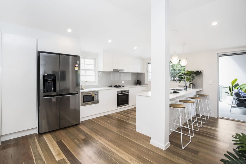 Bright kitchen and open dining add space to Park Avenue Terrace.
