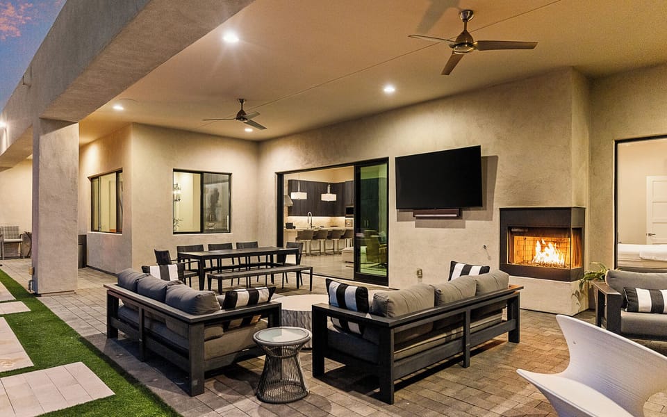 Relaxing spot with TV and comfortable seating for unwinding
