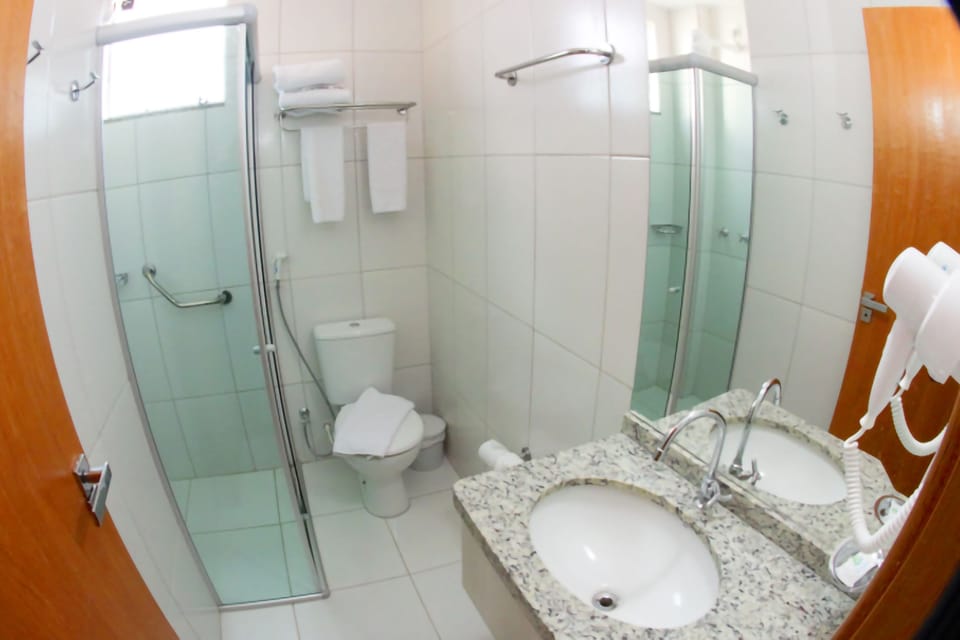 Shower, towels, soap, toilet paper