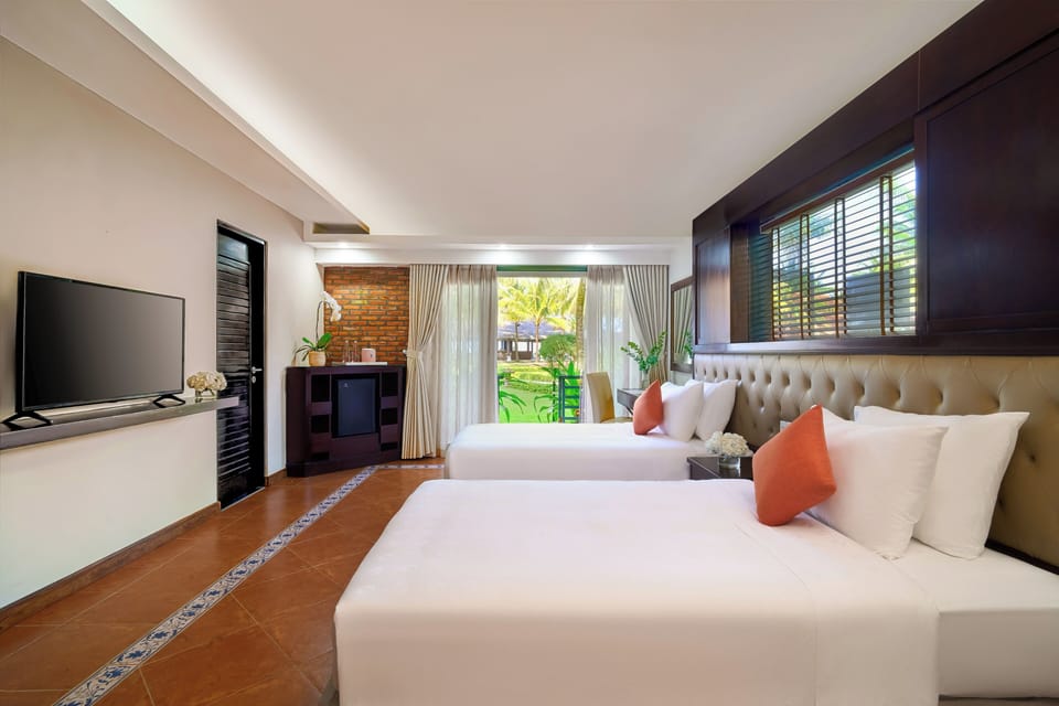 Premium bedding, down comforters, memory foam beds, free minibar