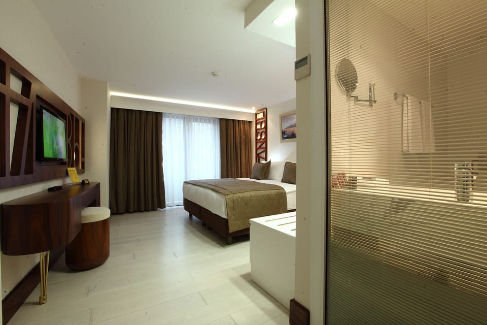 Memory foam beds, minibar, in-room safe, blackout drapes