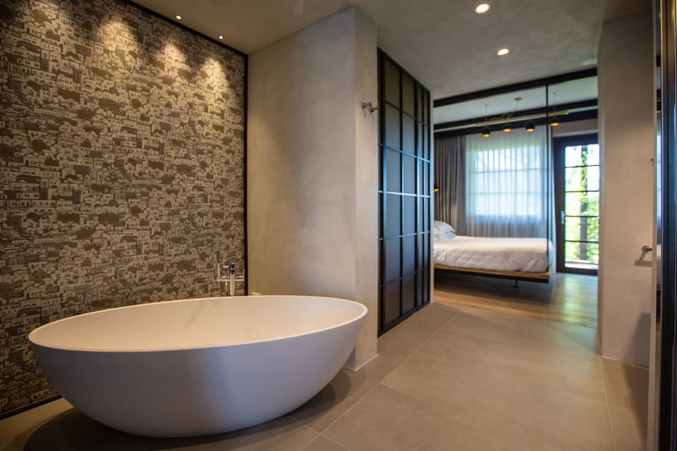 Suite | Bathroom | Shower, rainfall showerhead, designer toiletries, hair dryer