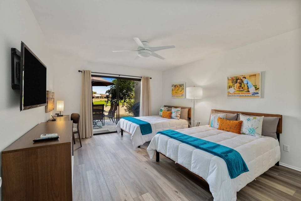 Guest Room with 2 Full Beds, TV, and Desk