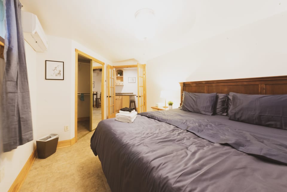 The bedroom has a king size bed and soft, 400 thread count sheets.
