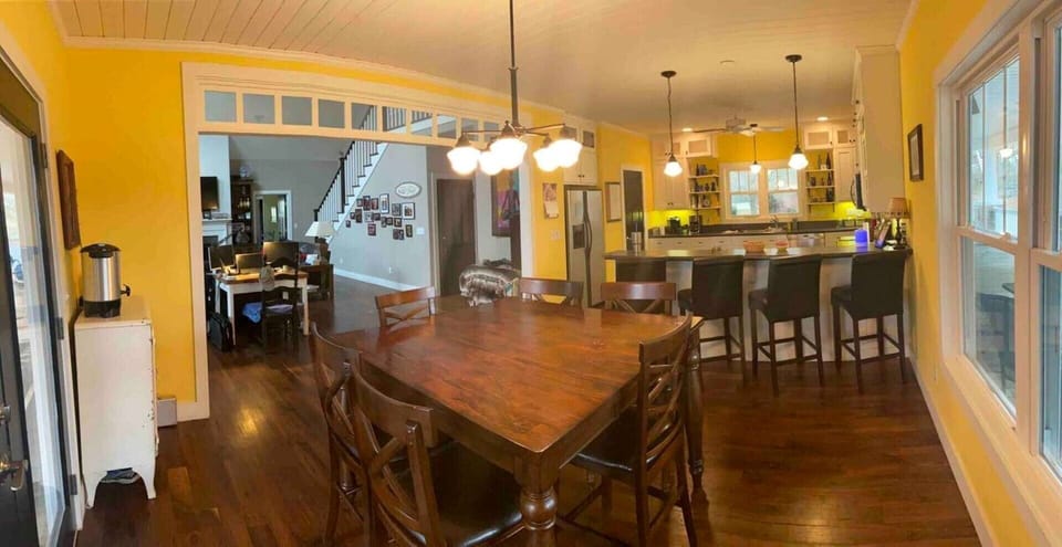 View in dining room looking towards the living room / kitchen. 