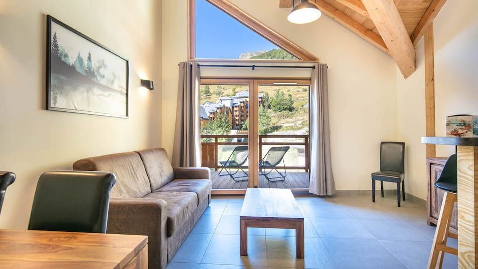 Sink into the cozy sofa after a day of exploring the area.