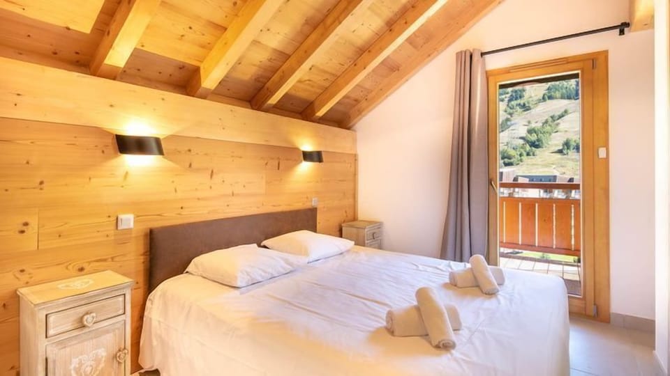 Relax on the comfy bed after a day outside.