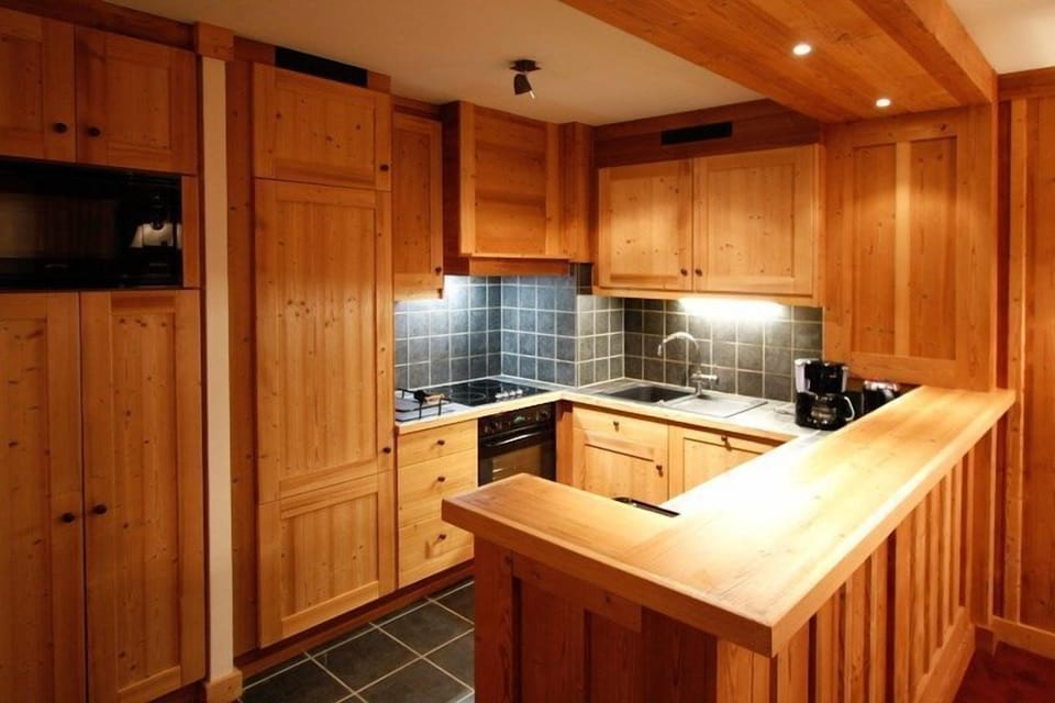 Prepare a meal in the equipped kitchen.