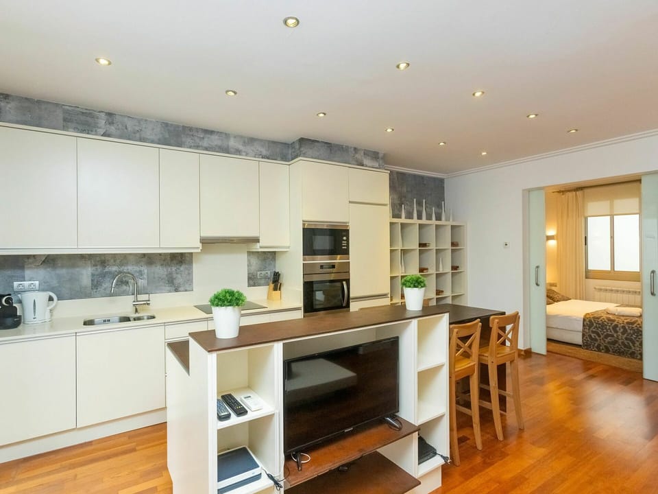 Countertop, Furniture, Property, Cabinetry, Kitchen, Kitchen Appliance, Wood, Kitchen Stove, Interior Design, Table