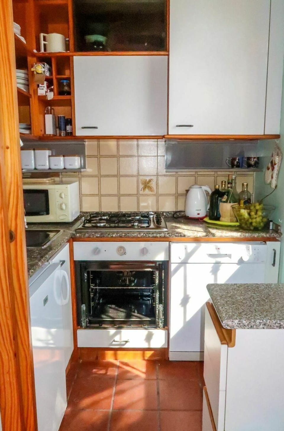 Room, Kitchen, Property, Countertop, Kitchen Stove, Cabinetry, Furniture, House, Major Appliance, Building