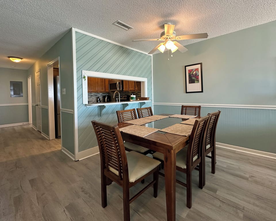 Gather for a meal (dining for 6 with additional dining on the balcony)