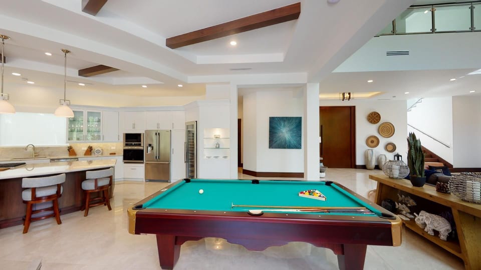This house is made for entertainment for you and your group. Large spaces, pool table etc.