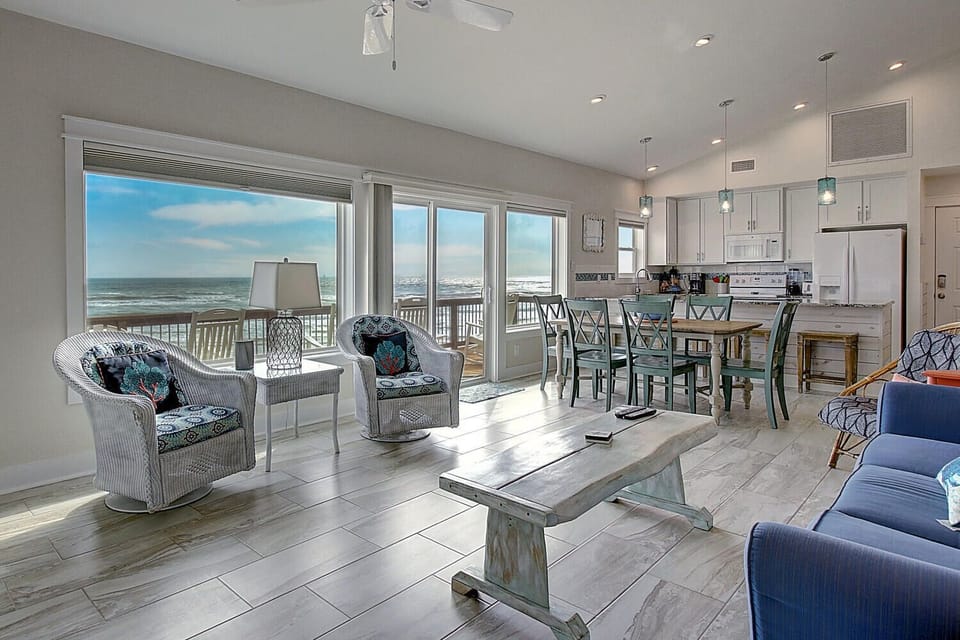 Wake up to endless ocean views in your bright, airy living space where coastal comfort meets modern style.