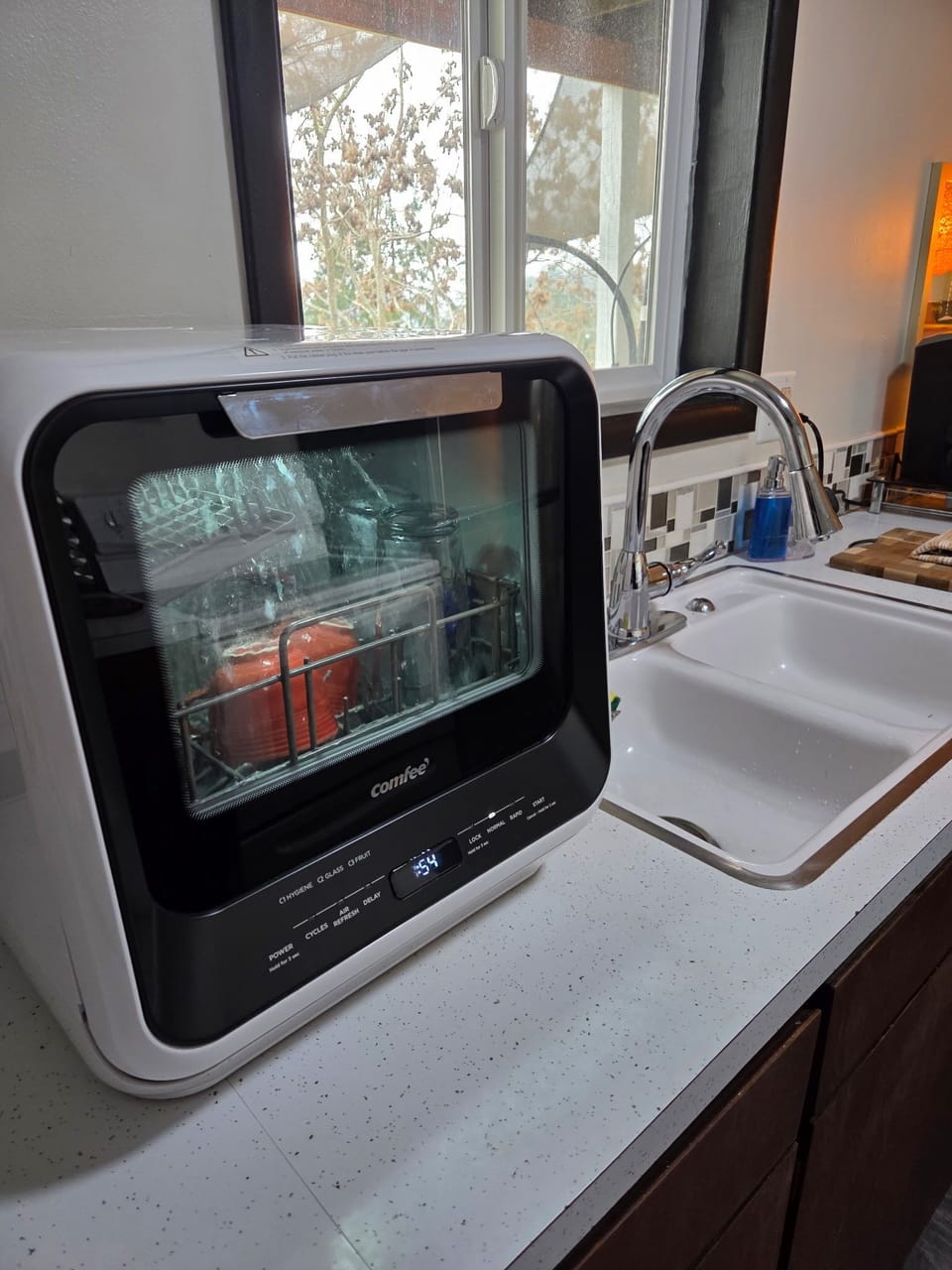 A full bathroom stocked with Ammenities and lush towels.