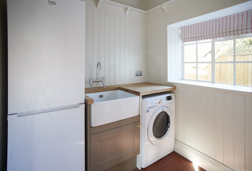 Ground floor: Utility room with combined washer/dryer