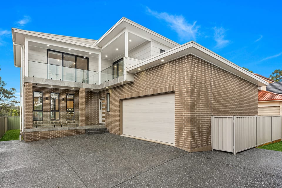 House Front with Double Garage and plenty of external parking