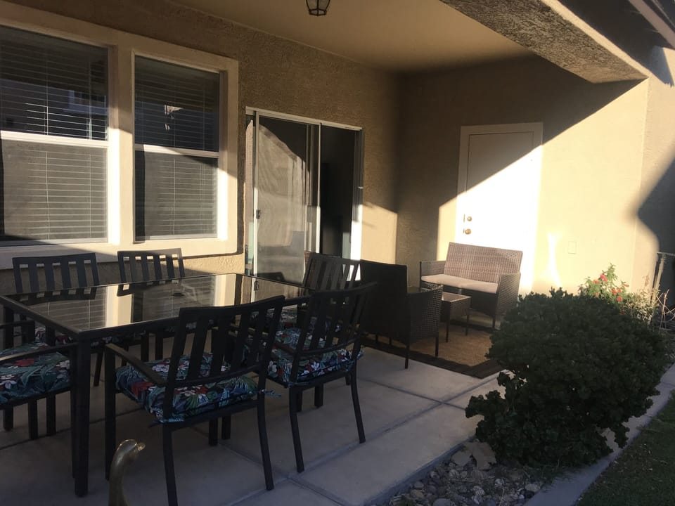 Back patio has room for everyone.  Includes a gas grill.