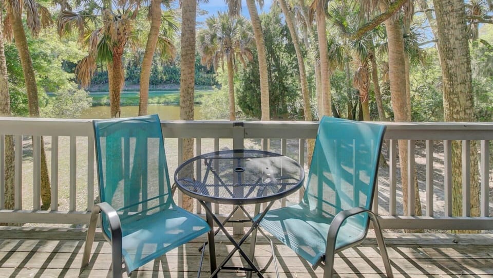 Private deck with lagoon & golf course views—your morning coffee spot.
