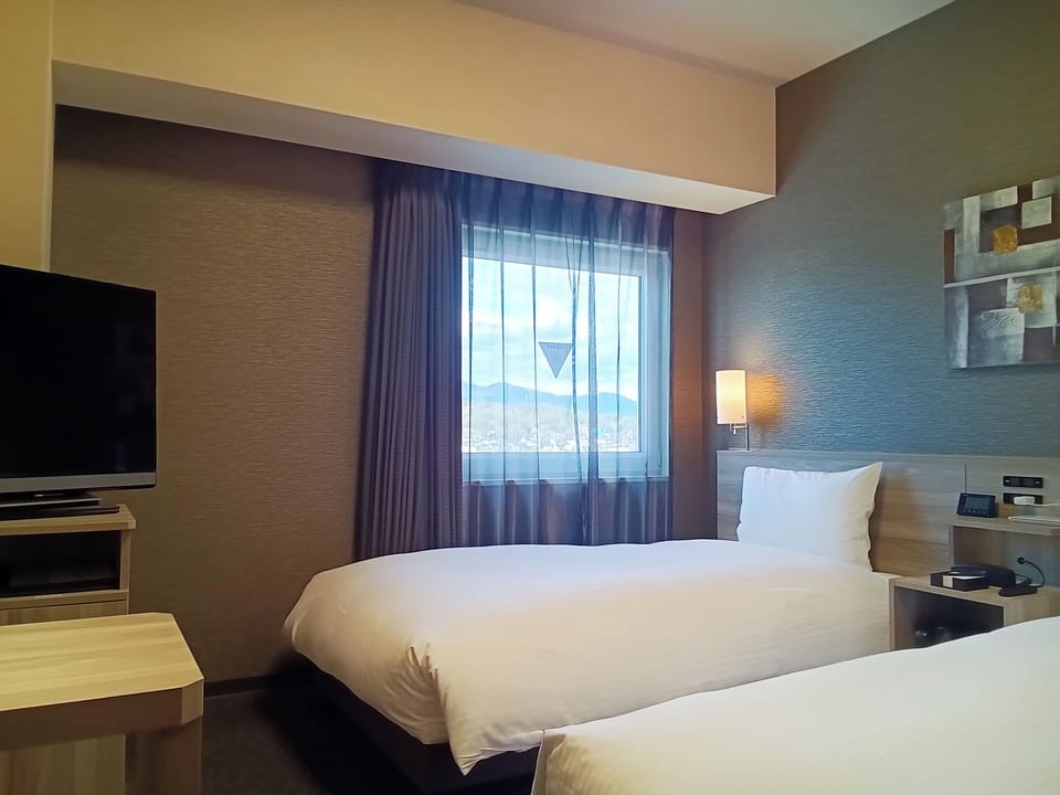 Twin Room, Non Smoking | Desk, WiFi (free), bed sheets