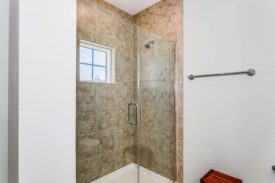 Beautiful walk in shower where you can retreat to at the end of a busy day