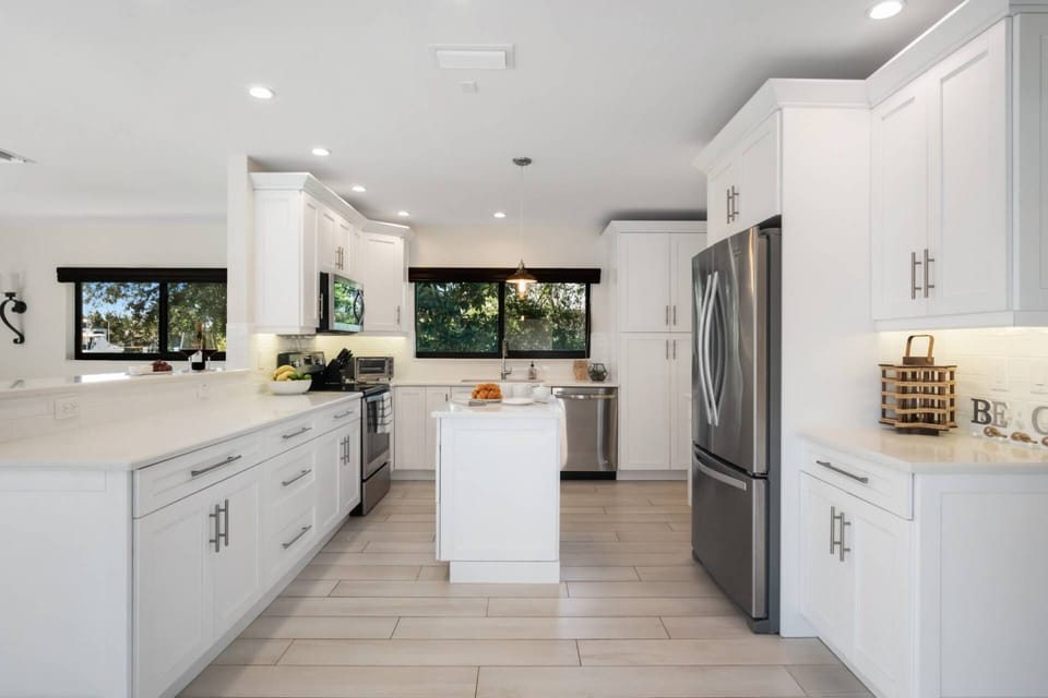 Enjoy the updated finishes, including quartz countertops and stainless steel appliances.