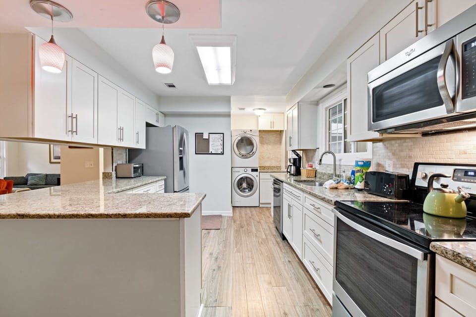 Sitting in Dining area looking into Kitchen
