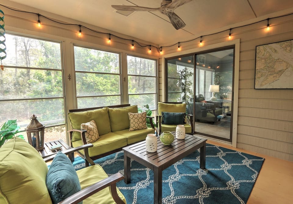 Sunroom with access to living room and kitchen
